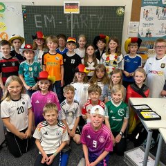 Class 3a in their fan outfits.