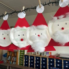 Santa Clauses made from clay paper.