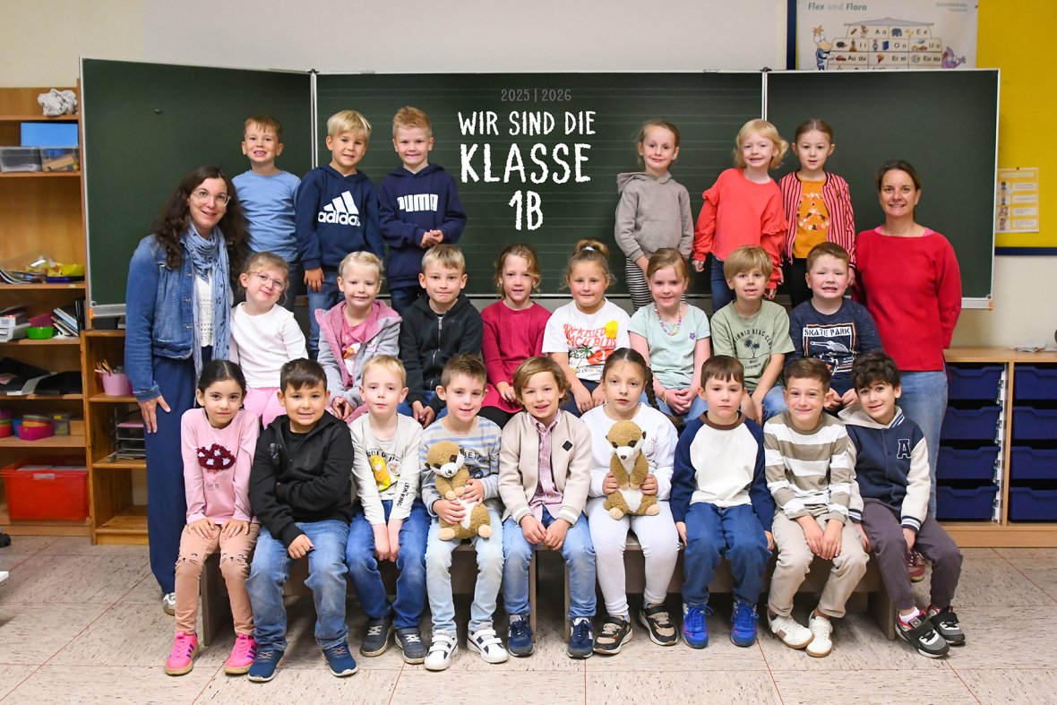 Children of the meerkat class with their class teachers.